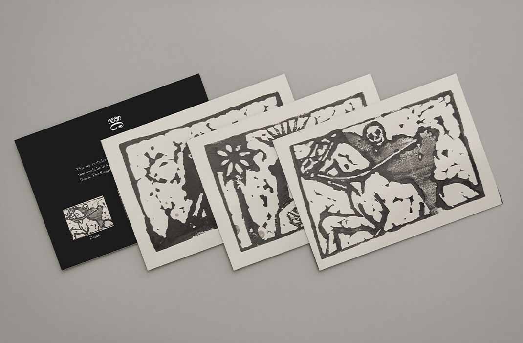 Four cards: one with a a skeleton on a horse, one with a woman, one with a man on a boat, and one that has all the previously listed characters on it.